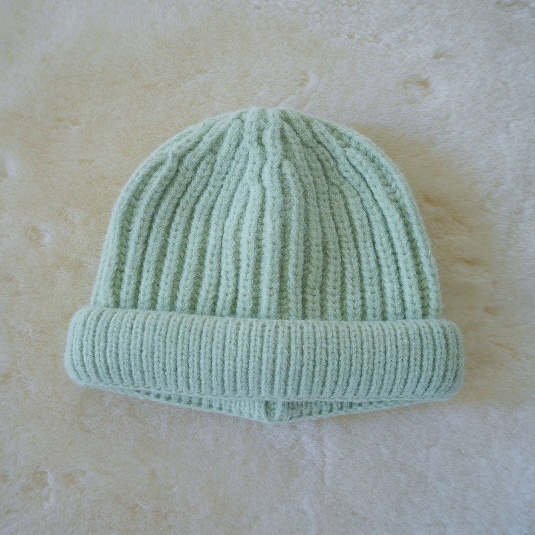 Coco & Bob - gebreide kindermuts - pastelgroen