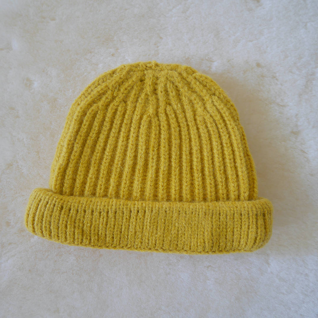 Coco & Bob - gebreide kindermuts - mosterdgeel